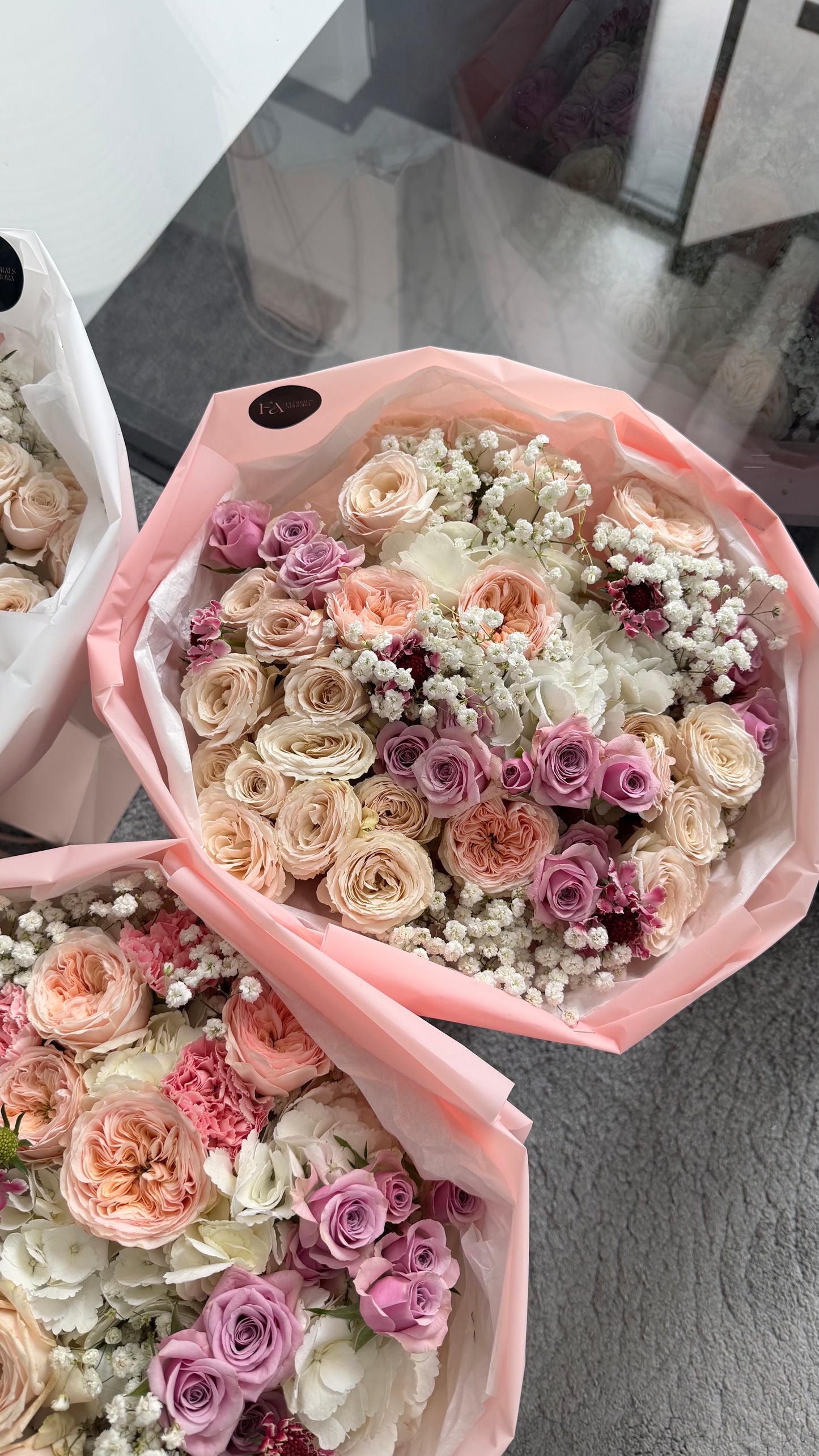 florist pick hydrangeas and rose bouquet